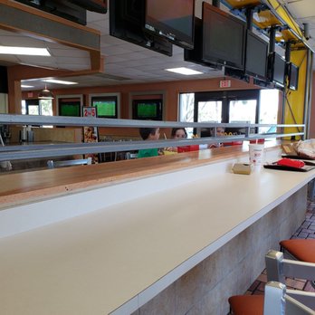 McDonald's - a view of the counter and tvs - Fast Food Near Me - Lantana, Florida