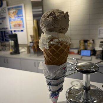 COWS - a cone of ice cream on a table - Ice Cream & Frozen Yogurt Near Me - Whistler, British Columbia COWS - a cone of ice cream on a table - Ice Cream & Frozen Yogurt Near Me - Whistler, British Columbia