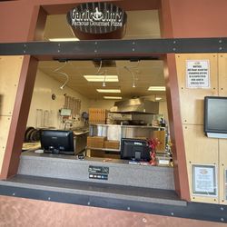 Garlic Jim's Famous Gourmet Pizza - Front counter