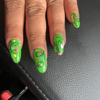 French Nails Luxury Spa & Bar - She drew the grinch finger with ornament and Christmas lights on each hand, I got a lot of compliments on my nails. - Nail Salons Near Me - Dallas, Texas