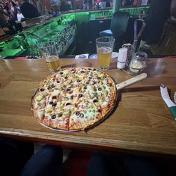Glory B's Corner Saloon - Build your own pizza with chicken, pineapple, green peppers, mushrooms & black olives