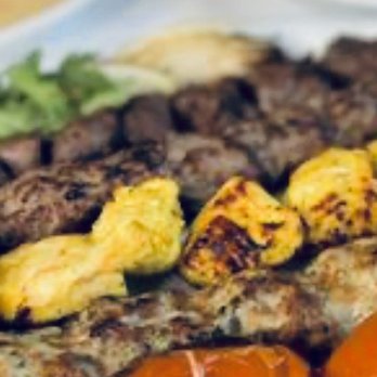 New Reza's Restaurant - Family style with choice of three meats - Buffets Near Me - Oak Brook, Illinois New Reza's Restaurant - Family style with choice of three meats - Buffets Near Me - Oak Brook, Illinois