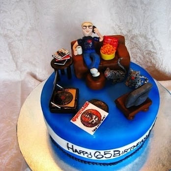 BellaTiers Custom Cake Designs - a man sitting on a couch - Custom Cakes Near Me