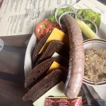 The Auslander - We got the "snack sausage" as an appetizer and it was yummy! Goes perfect with the pumpernickel bread - German Near Me - Fredericksburg, Texas