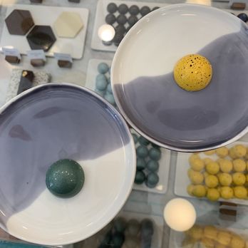 andSons Chocolates - Yuzu caramel (left). Passion fruit caramel (right). - Chocolatiers & Shops Near Me - Beverly Hills, California andSons Chocolates - Yuzu caramel (left). Passion fruit caramel (right). - Chocolatiers & Shops Near Me - Beverly Hills, California
