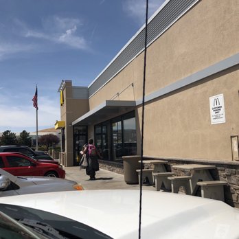 McDonald's - a woman walking out of a mcdonald's - Burgers Near Me - Prescott Valley, Arizona McDonald's - a woman walking out of a mcdonald's - Burgers Near Me - Prescott Valley, Arizona