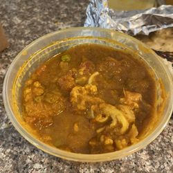 Himalayan Curry House - Nasty improperly represented Aloo Cauli ( doesn't look like the same thing promoted in DD)