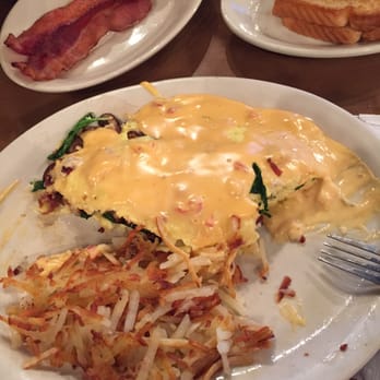 Cafe Java - Round Rock - Yummy Ironman omelette covered with queso, and side of bacon! - Coffee & Tea Near Me - Round Rock, Texas Cafe Java - Round Rock - Yummy Ironman omelette covered with queso, and side of bacon! - Coffee & Tea Near Me - Round Rock, Texas