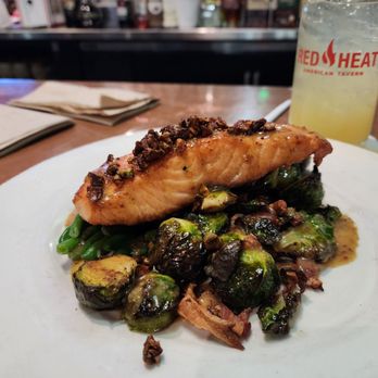 Red Heat Tavern - Pistachio salmon with green beans and Brussel sprouts which substituted the potatoes - New American Near Me - Wilmington, Massachusetts Red Heat Tavern - Pistachio salmon with green beans and Brussel sprouts which substituted the potatoes - New American Near Me - Wilmington, Massachusetts