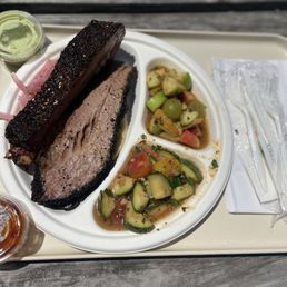 two meat plate; lamb rib, brisket. sides: fruit chaat, kachumber salad. two meat plate; lamb rib, brisket. sides: fruit chaat, kachumber salad.