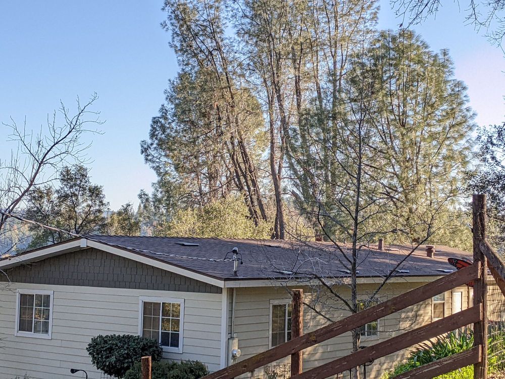 Slide of Mountain Roofing Systems