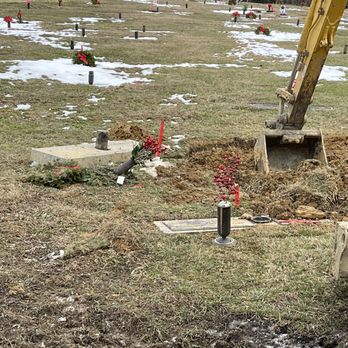 Kanawha Valley Memorial Gardens - Back hoe in grave of loved one 3 days after burial. Headstone not placed back and spray thrown to side. Disrespect at its finest. - Funeral Services & Cemeteries Near Me - Glasgow, West Virginia Kanawha Valley Memorial Gardens - Back hoe in grave of loved one 3 days after burial. Headstone not placed back and spray thrown to side. Disrespect at its finest. - Funeral Services & Cemeteries Near Me - Glasgow, West Virginia