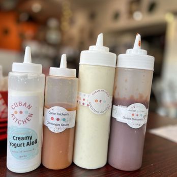 Cuban Kitchen - a variety of condiments on a table - Cuban Near Me - San Mateo, California