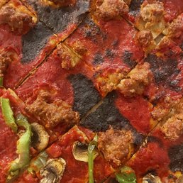 a close up of a pizza a close up of a pizza