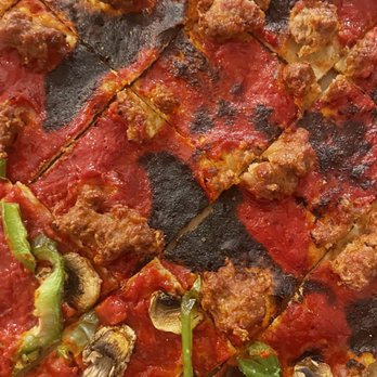 Aurelio's Pizza - a close up of a pizza - Pizza Near Me - Ramsey, Minnesota Aurelio's Pizza - a close up of a pizza - Pizza Near Me - Ramsey, Minnesota