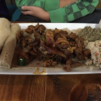 Goorsha - Lamb awaze tips and sides on injera - Ethiopian Near Me - Durham, North Carolina