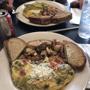 Javier's Café - Our fantastic breakfast!!! Fire roasted tomato and asparagus omelette for me, spinach, avocado, sausage and Muenster omelette for him - Breakfast & Brunch Near Me - Smithtown, New York Javier's Café - Our fantastic breakfast!!! Fire roasted tomato and asparagus omelette for me, spinach, avocado, sausage and Muenster omelette for him - Breakfast & Brunch Near Me - Smithtown, New York