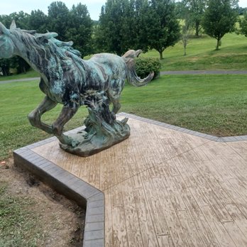 TORRES CONCRETE - a bronze statue of a running horse - Masonry/Concrete Near Me TORRES CONCRETE - a bronze statue of a running horse - Masonry/Concrete Near Me