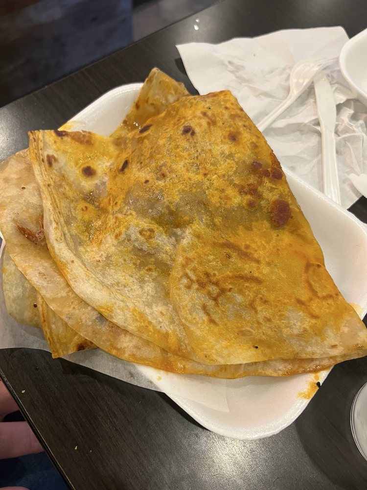 Unos Tacos Y Birria