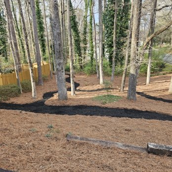Lucy's Landscape - Mulch pathway and pine straw - Lawn Services Near Me