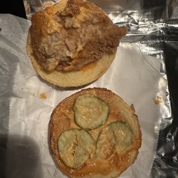 KFC - The most pitiful, tiny Spicy Chicken Sandwich I've ever seen. More buns than chicken! This is a quality control issue.