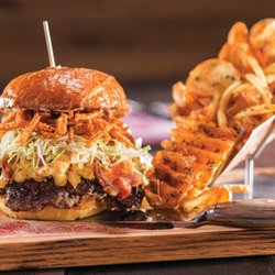 Guy Fieri's Tunica Kitchen + Bar - Bacon Mac-n-Cheese Burger - Guy's award-winning burger voted best burger in Las Vegas by Seven Magazine!