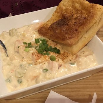 Cafe Mirage - Seafood pot pie: shrimp, scallops, rockfish in a cream sauce and served with puff pastry - New American Near Me - Ocean City, Maryland