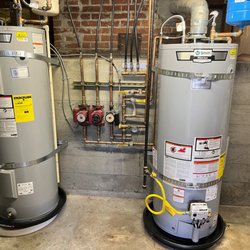 Bob Larson Plumbing - Left (new water tank) - Right (new radiant heating water tank)