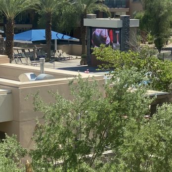 Marriott's Shadow Ridge II- The Enclaves - View from my bedroom of the huge screen near one of the pool areas. - Hotels Near Me - Palm Desert, California Marriott's Shadow Ridge II- The Enclaves - View from my bedroom of the huge screen near one of the pool areas. - Hotels Near Me - Palm Desert, California