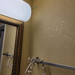 Days Inn by Wyndham Okemah - There is toothpaste on the wall by the light