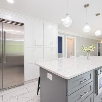 Hughes Kitchens & Bath - a large kitchen with a center island - General Contractors Near Me - Canton, Ohio Hughes Kitchens & Bath - a large kitchen with a center island - General Contractors Near Me - Canton, Ohio