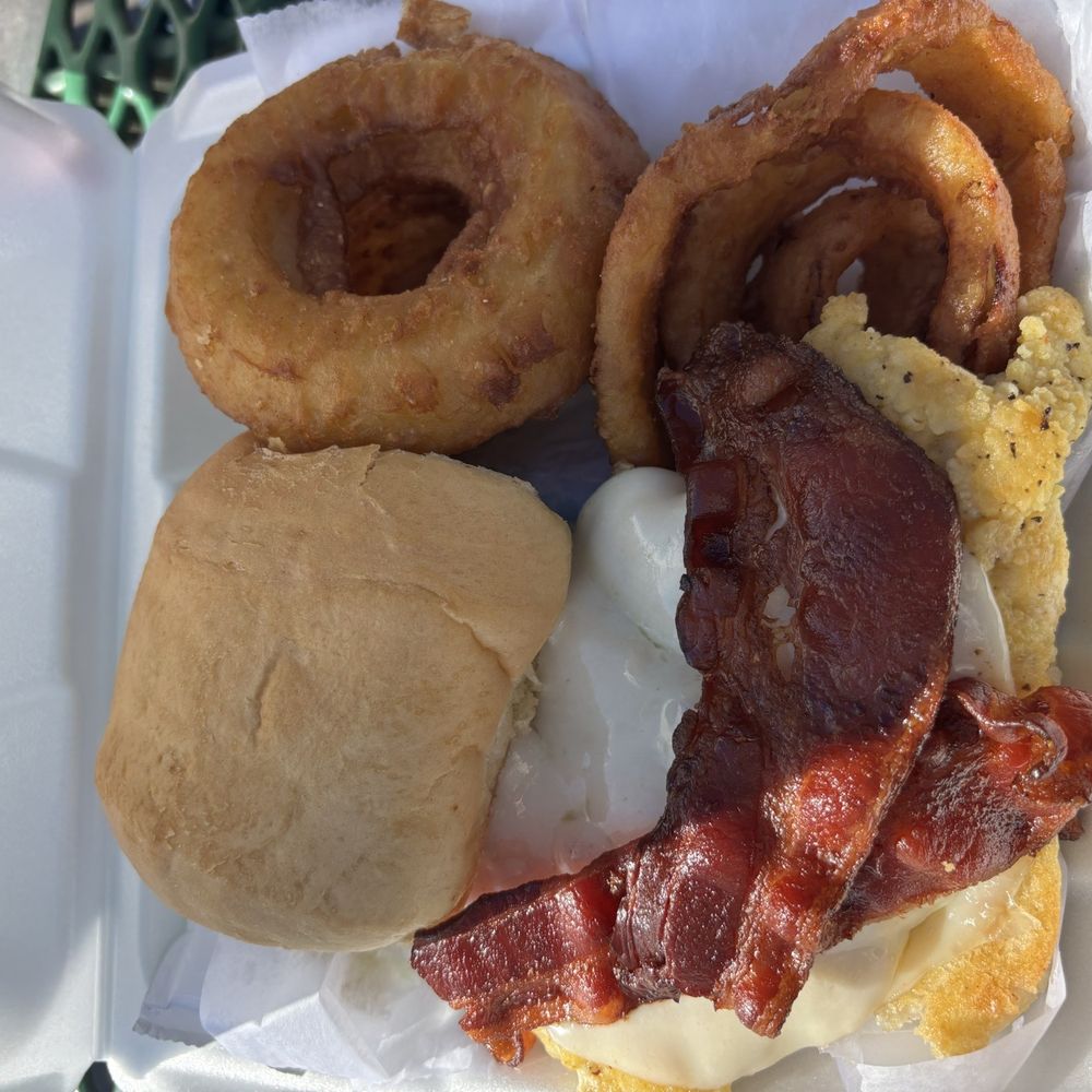 Paolucci Restaurant & Lounge - Gambino chicken sandwich and onion rings - Lounges Near Me - Atchison, Kansas