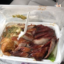 Three meat and rice combo.   Roast. Pork, honey roast duck and soy sauce chicken