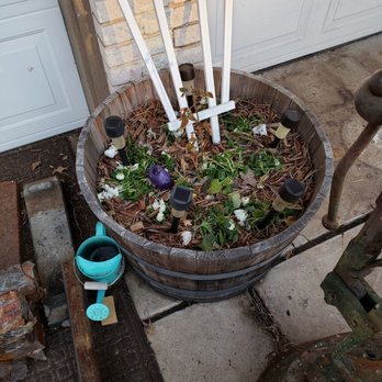 CityScapes Landscape Services - a bucket with candles and flowers - Lawn Services Near Me - Oklahoma City, Oklahoma CityScapes Landscape Services - a bucket with candles and flowers - Lawn Services Near Me - Oklahoma City, Oklahoma