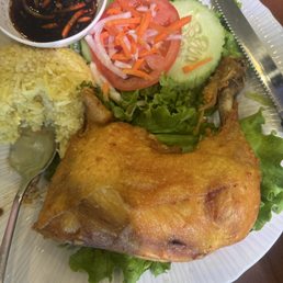 Tasty chicken and rice . Friendly service Tasty chicken and rice . Friendly service