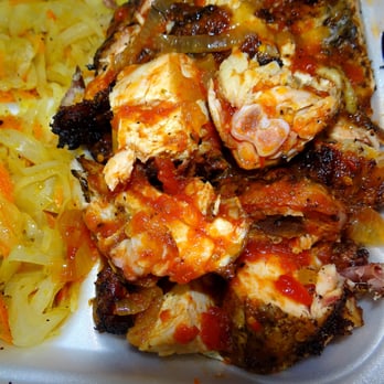 One Stop West Indies Restaurant - Close-up of the jerk chicken. - Caribbean Near Me - West Palm Beach, Florida One Stop West Indies Restaurant - Close-up of the jerk chicken. - Caribbean Near Me - West Palm Beach, Florida