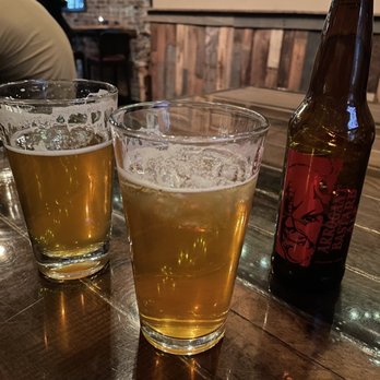The Brick Room - two glasses of beer and a bottle of beer - Bars Near Me - Salisbury, Maryland The Brick Room - two glasses of beer and a bottle of beer - Bars Near Me - Salisbury, Maryland