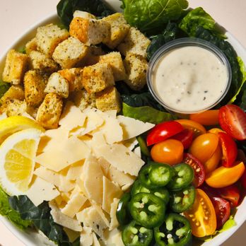 Evergreens - a bowl of salad with croutons, cheese, tomatoes, lettuce, tomatoes, and cheese croutons - Salad Near Me - Bellevue, Washington Evergreens - a bowl of salad with croutons, cheese, tomatoes, lettuce, tomatoes, and cheese croutons - Salad Near Me - Bellevue, Washington