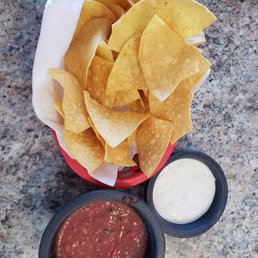 chips & salsa (the white salsa was cold & disgusting) chips & salsa (the white salsa was cold & disgusting)