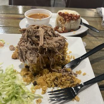 Papi's Cafe and Grill - Mofongo/yellow rice and pork. Side order of white rice and beans. Also, had their sweet plantains. - Puerto Rican Near Me - Fort Walton Beach, Florida Papi's Cafe and Grill - Mofongo/yellow rice and pork. Side order of white rice and beans. Also, had their sweet plantains. - Puerto Rican Near Me - Fort Walton Beach, Florida