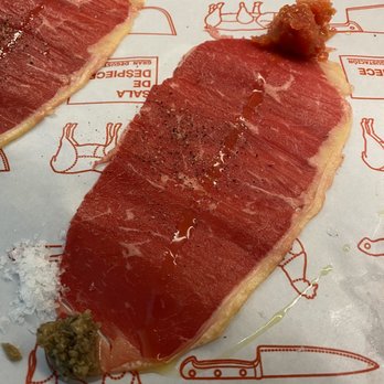 Sala de Despiece - Thinly slice raw beef with salt and seasoning! - Gastropubs Near Me - Madrid, M
