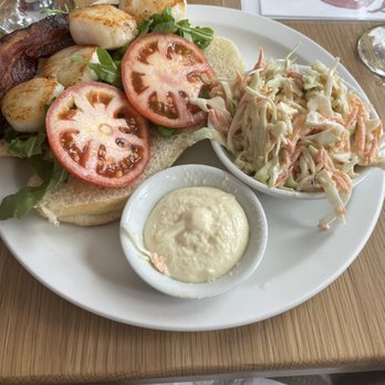 Savvy Sailor - Scallop po boy - Canadian (New) Near Me - Lunenburg, Nova Scotia