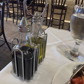 Gaston's Italian Steakhouse - Table oil and vinegar - Italian Near Me - Virginia Beach, Virginia Gaston's Italian Steakhouse - Table oil and vinegar - Italian Near Me - Virginia Beach, Virginia
