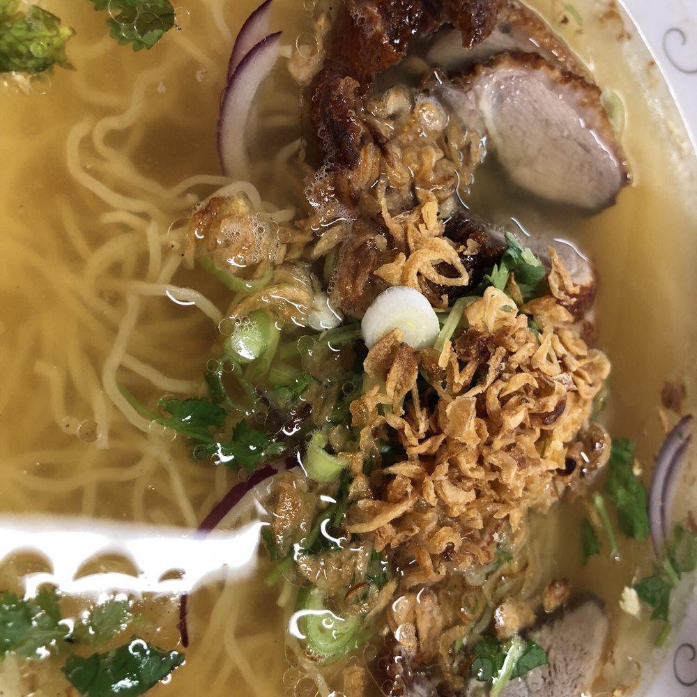 Crispy duck soup. Egg noodles. Fried crispy garlic. Bean sprouts and basil. Crispy duck soup. Egg noodles. Fried crispy garlic. Bean sprouts and basil.