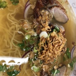 Crispy duck soup. Egg noodles. Fried crispy garlic. Bean sprouts and basil.