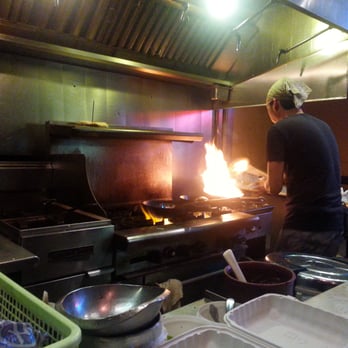 Thai Tom - Chef cooking up a storm - Thai Near Me - Seattle, Washington