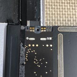DropFixed - Prior repair by another shop. That broken pin on the battery connector cause the device to boot-loop.