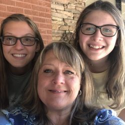 Red Belly Rooster Auction - Patty with daughters, Maddie & Addy