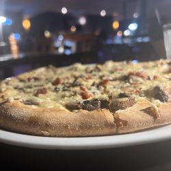 Pescatore Ristorante - Vegan mushroom pizza. Don't be afraid of the vegan cheese. It's creamier and better than the real thing!