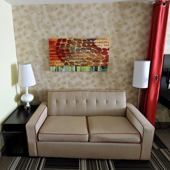 Home2 Suites by Hilton Augusta,GA - This is a view of the couch in room 418. Photo taken July 25, 2019. - Hotels Near Me - Augusta, Georgia Home2 Suites by Hilton Augusta,GA - This is a view of the couch in room 418. Photo taken July 25, 2019. - Hotels Near Me - Augusta, Georgia